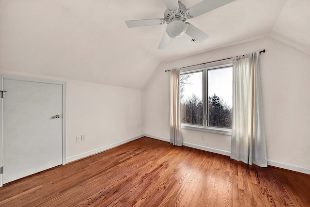 bonus room featuring wood-type flooring, vaulted ceiling, and ceiling fan