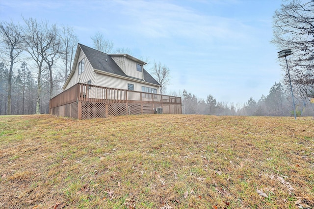 view of yard with a wooden deck