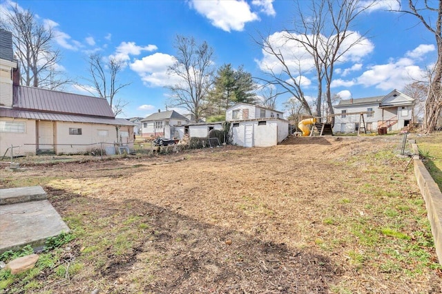 view of yard with a shed