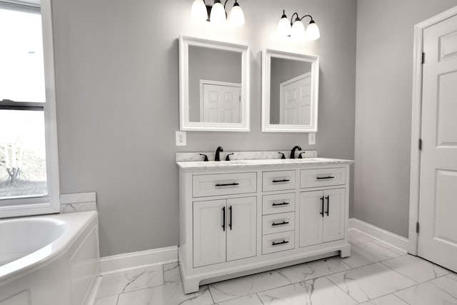 bathroom featuring a bathtub and vanity