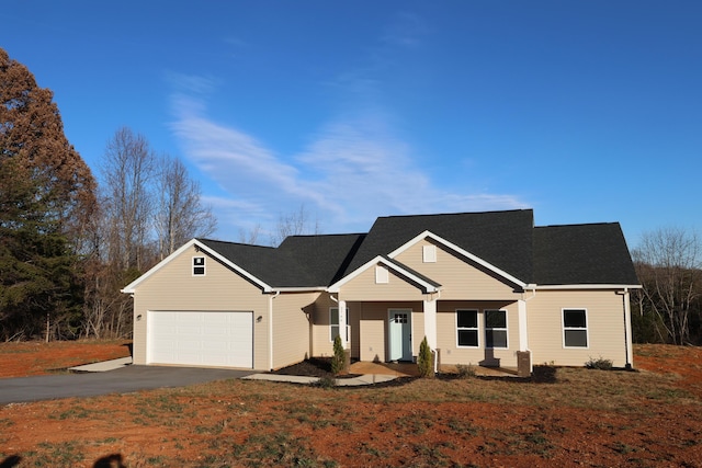 view of front of property with a garage