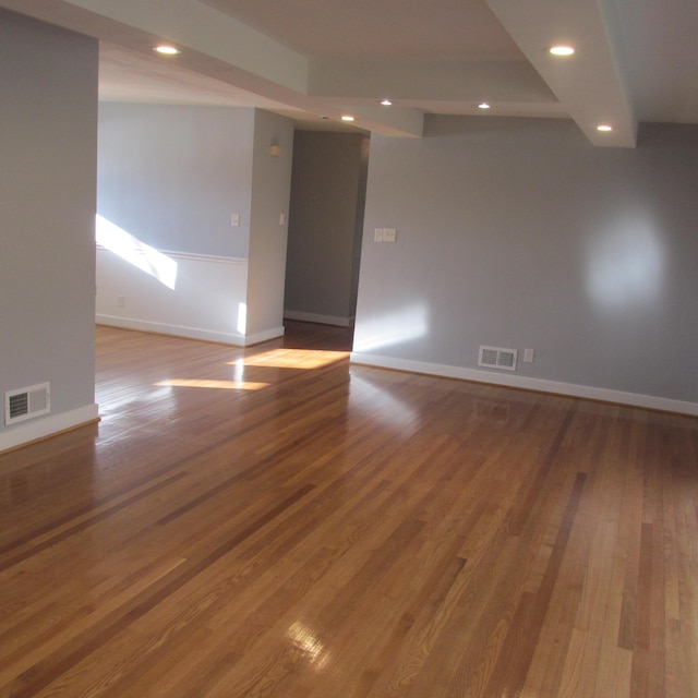 unfurnished room featuring hardwood / wood-style floors