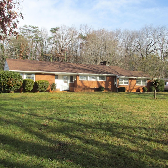 exterior space with a lawn