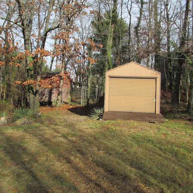 garage with a yard