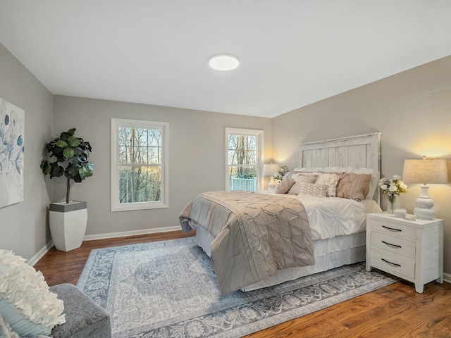 bedroom featuring dark wood-type flooring