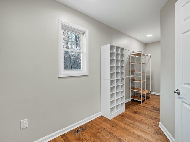 walk in closet featuring light wood-type flooring