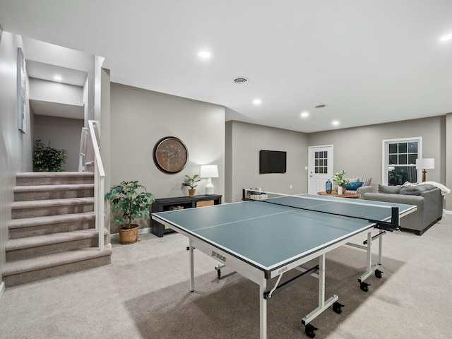 game room with light colored carpet