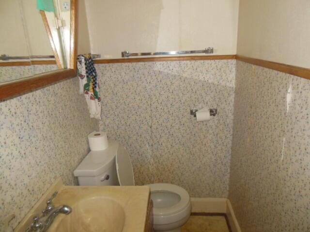 bathroom with sink and toilet