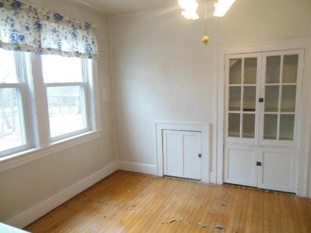 unfurnished room featuring light hardwood / wood-style flooring