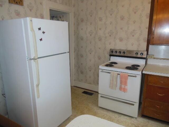 kitchen featuring white appliances