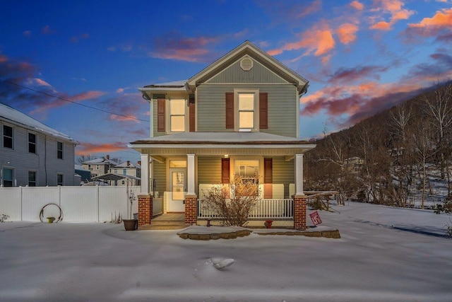 view of front property with covered porch