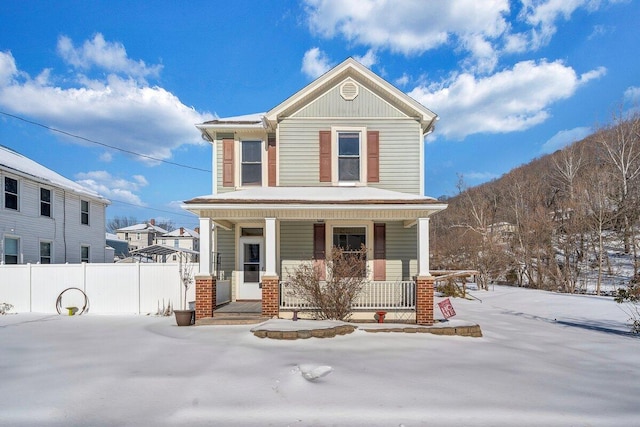 view of property with a porch