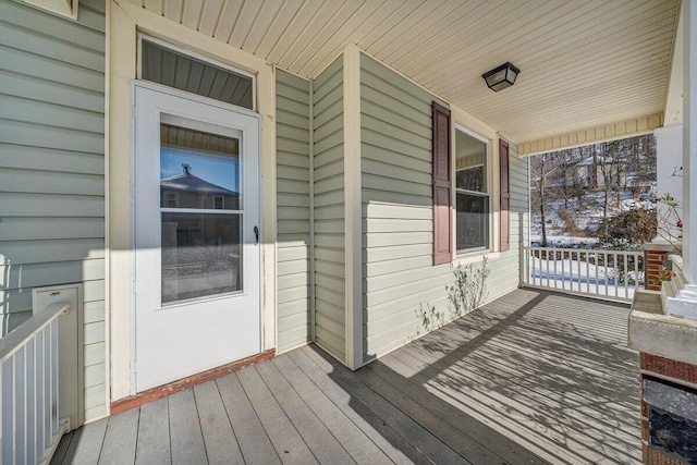 wooden terrace with covered porch