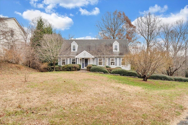 new england style home with a front lawn