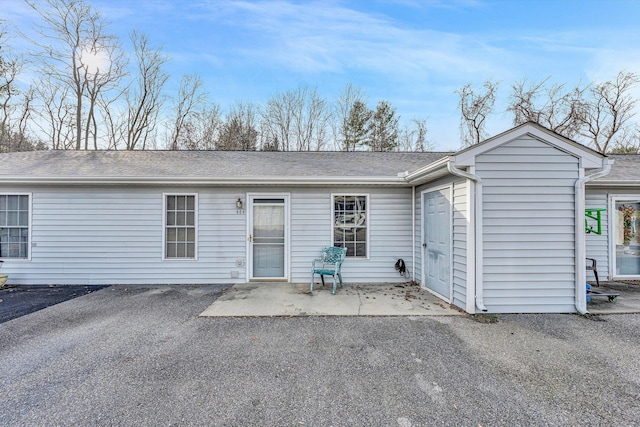 back of property featuring a patio area