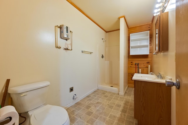 bathroom with toilet, a stall shower, crown molding, baseboards, and vanity