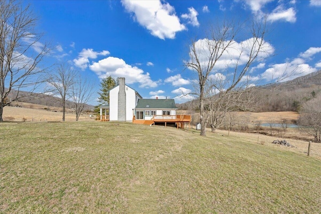 view of yard with a deck