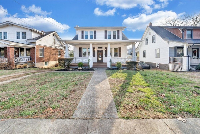 view of front of house with a porch and a front yard