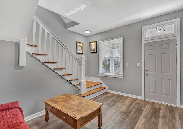 entrance foyer featuring hardwood / wood-style floors