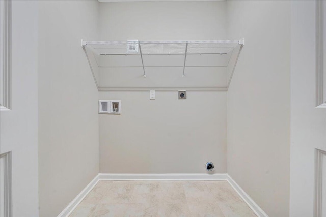 clothes washing area featuring hookup for a washing machine and hookup for an electric dryer