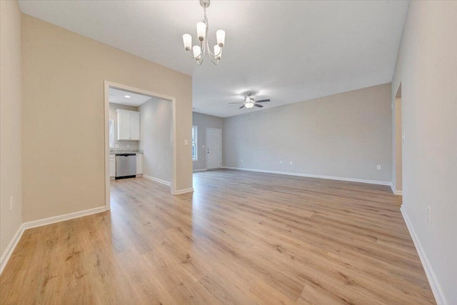 unfurnished room with ceiling fan with notable chandelier and light wood-type flooring