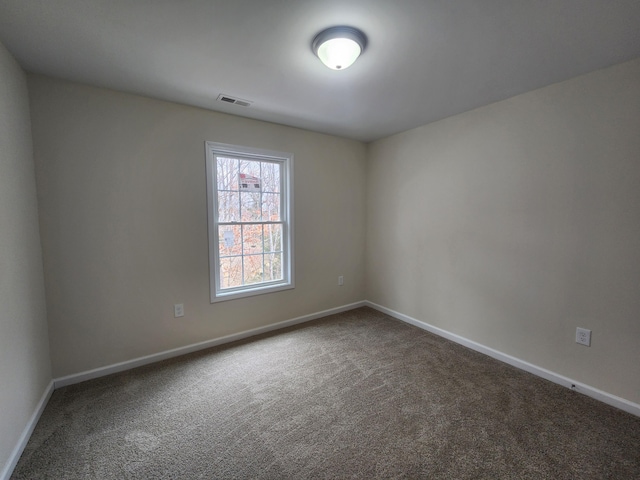 view of carpeted spare room