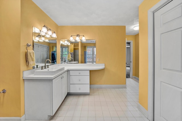 bathroom with tile patterned flooring and vanity