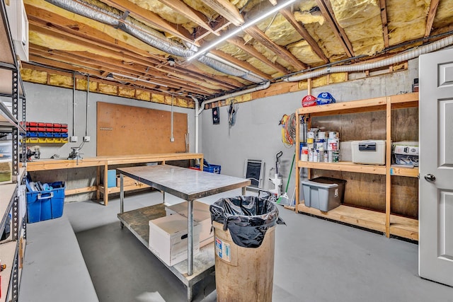 basement with a workshop area