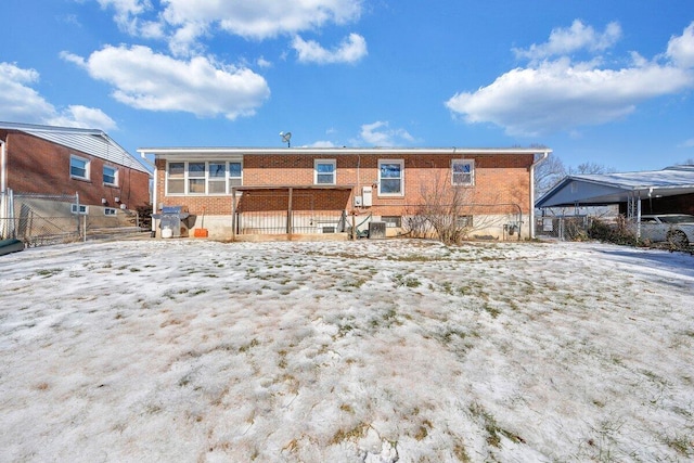 view of snow covered house