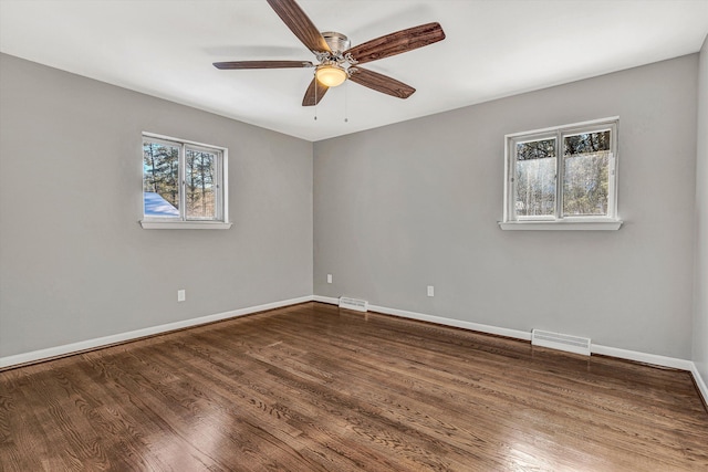 unfurnished room with hardwood / wood-style flooring and ceiling fan