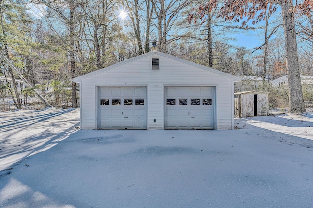 view of snow covered garage