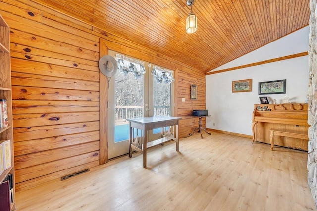 office featuring vaulted ceiling, light hardwood / wood-style flooring, wood ceiling, and french doors