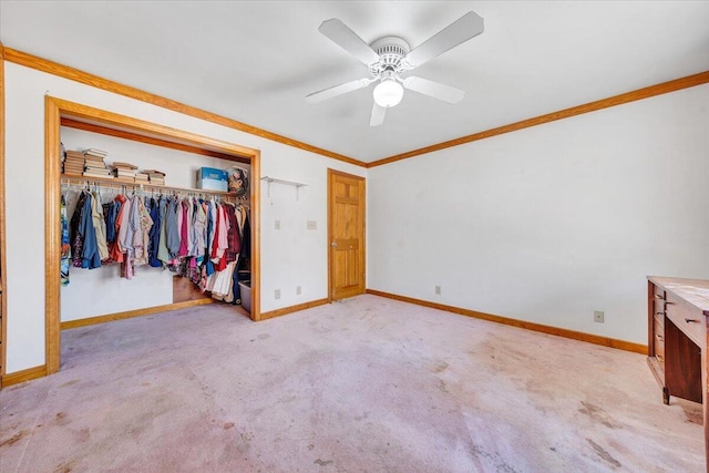 unfurnished bedroom with ceiling fan, ornamental molding, light carpet, and a closet