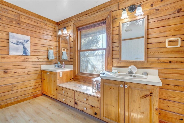 bathroom featuring vanity and hardwood / wood-style floors