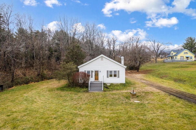 view of front of property with a front lawn