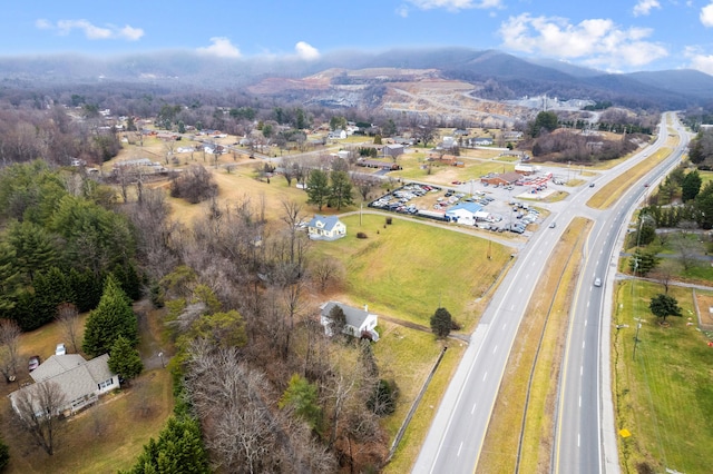 drone / aerial view featuring a mountain view