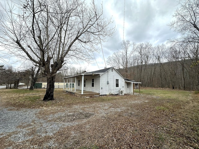 view of side of home featuring a patio