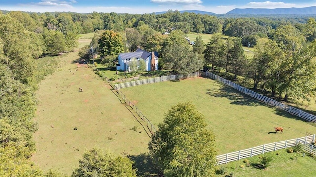 bird's eye view with a mountain view and a rural view