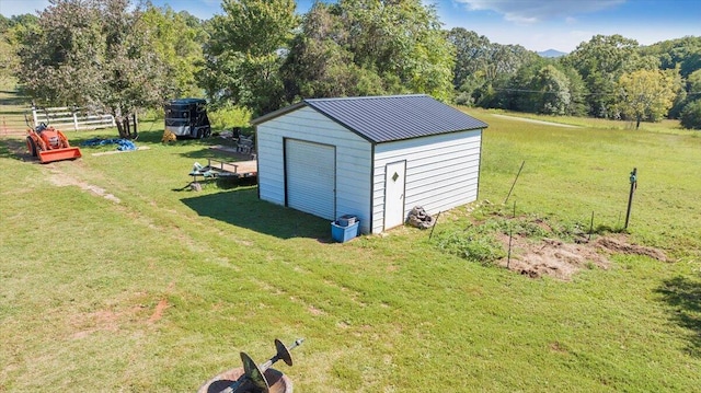 view of outdoor structure with a yard