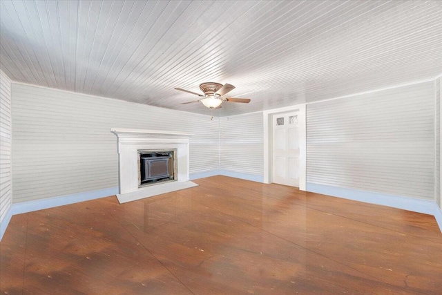 unfurnished living room featuring ceiling fan