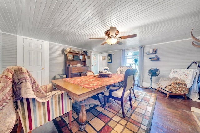 dining area featuring ceiling fan and wood-type flooring