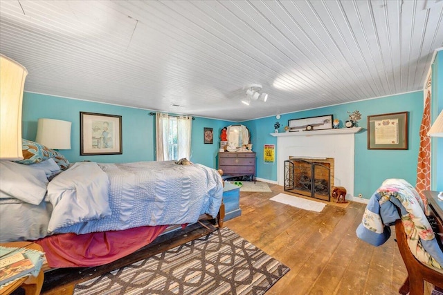 bedroom featuring hardwood / wood-style floors