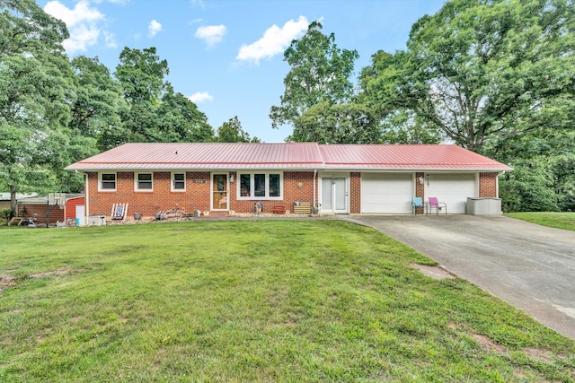 2148 Thomason Ln, Goodview, VA 24095 - ranch-style house featuring a garage, brick siding, metal roof, driveway, and a front yard