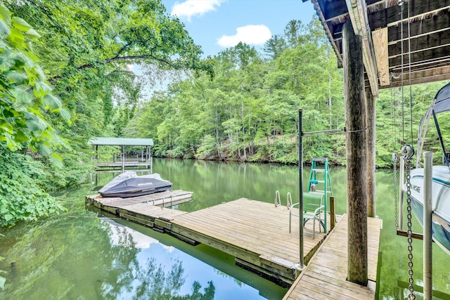 view of dock with a water view