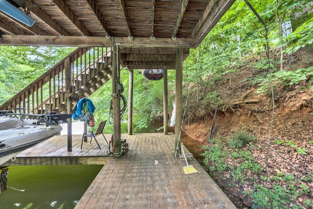 view of patio / terrace with a boat dock