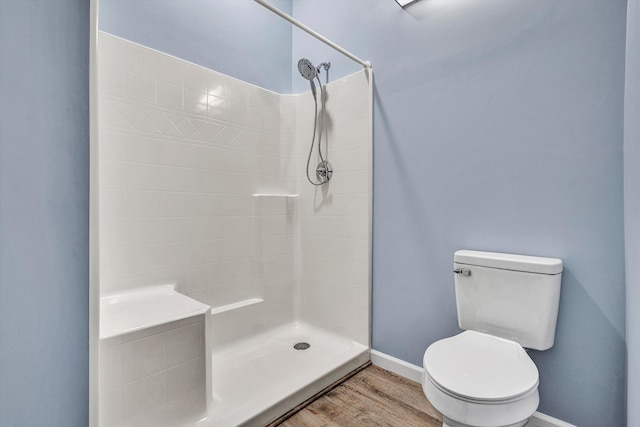 306 Carey Ave, Salem, VA 24153 - bathroom with a shower, hardwood / wood-style flooring, and toilet