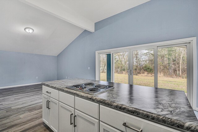306 Carey Ave, Salem, VA 24153 - kitchen featuring french doors, lofted ceiling with beams, dark hardwood / wood-style floors, stainless steel gas stovetop, and white cabinets