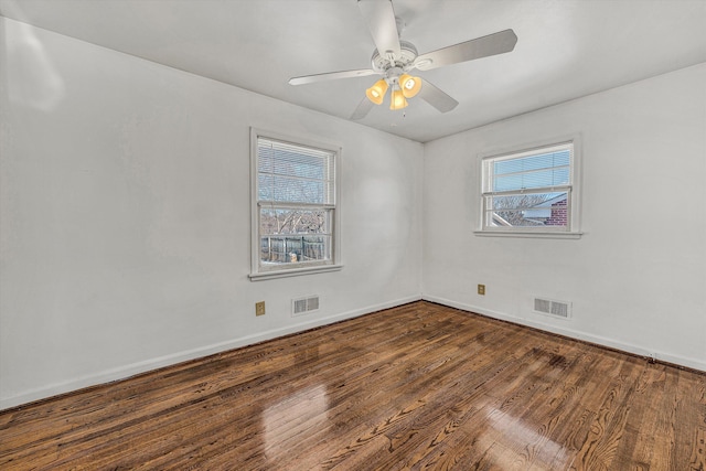 spare room featuring ceiling fan and wood-type flooring