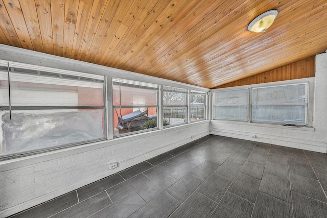 unfurnished sunroom with wood ceiling and vaulted ceiling