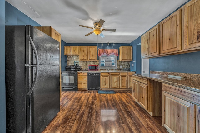 kitchen with backsplash, dark stone counters, black appliances, dark hardwood / wood-style floors, and ceiling fan